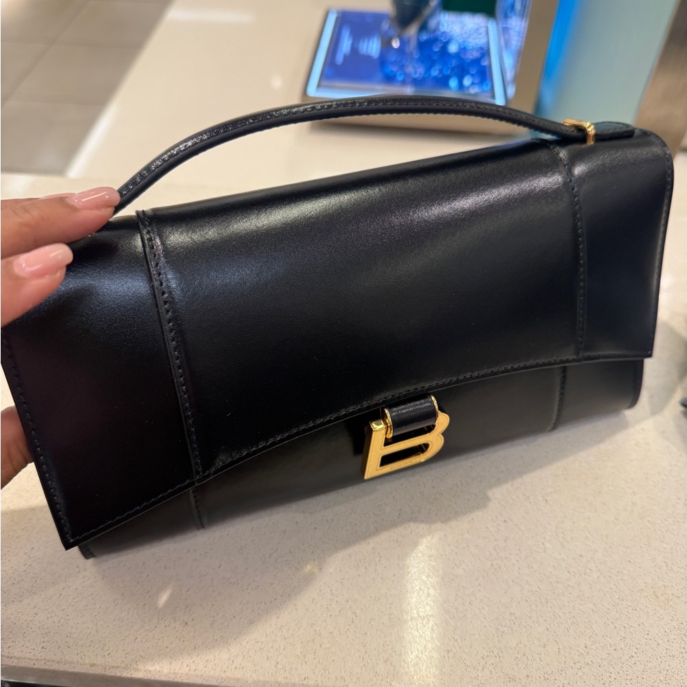 Balenciaga Black Leather Clutch with Gold Accent